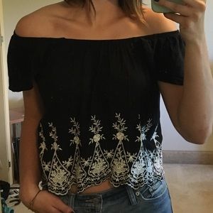 black off-the-shoulder shirt